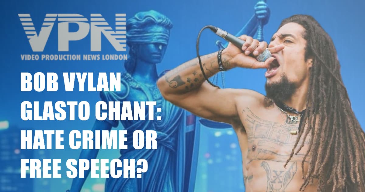 Bob Vylan performing shirtless with a microphone against a backdrop of Lady Justice and the Union Jack, alongside bold text reading “Bob Vylan Glasto Chant: Hate Crime or Free Speech?” and VPN (Video Production News London) logo.