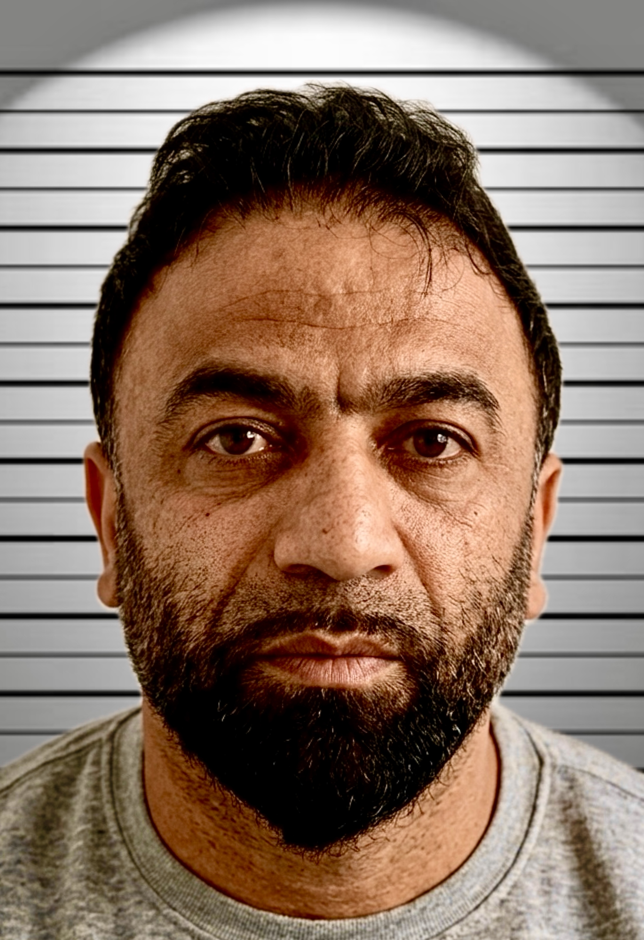 Image of convicted and jailed Iranian pensioner rapist Rahim Ghasemi