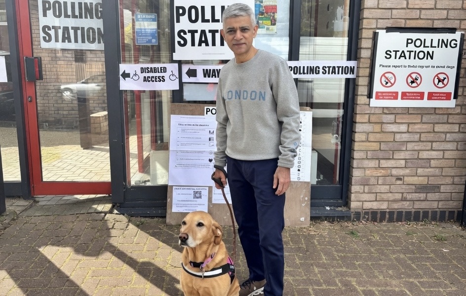 Sadiq Khan votes, labrador steals the show.